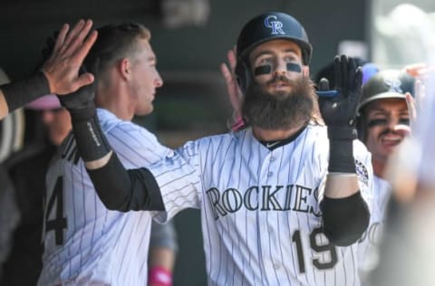 DENVER, CO – MAY 12: Charlie Blackmon #19 of the Colorado Rockies is congratulated in the dugout after hitting a two-run homer in the second inning of a game against the San Diego Padres at Coors Field on May 12, 2019 in Denver, Colorado. (Photo by Dustin Bradford/Getty Images)