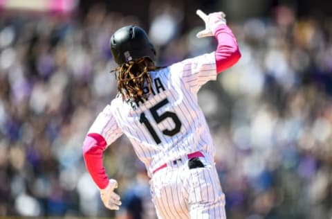 DENVER, CO – MAY 12: Raimel Tapia #15 of the Colorado Rockies celebrates after hitting a two-run seventh inning homer against the San Diego Padres at Coors Field on May 12, 2019 in Denver, Colorado. (Photo by Dustin Bradford/Getty Images)