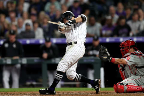 DENVER, COLORADO – APRIL 19: Garrett Hampson #1 of the Colorado Rockies hits a RBI single in the sixth inning against the Philadelphia Phillies at Coors Field on April 19, 2019 in Denver, Colorado. (Photo by Matthew Stockman/Getty Images)