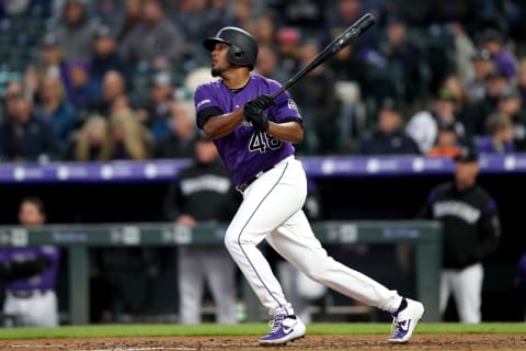 DENVER, COLORADO – MAY 10: German Marquez #48 of the Colorado Rockies hits a three RBI double in the fourth inning against the San Diego Padres at Coors Field on May 10, 2019 in Denver, Colorado. (Photo by Matthew Stockman/Getty Images)