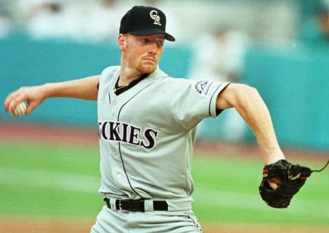 Colorado Rockies pitcher John Thomson throws a pitch against Florida Marlins outfielder Gary Sheffield in the sixth inning 01 June at Pro Player Stadium in Miami, FL. Thomson went four for four at the plate, had three RBIs and pitched the complete game to record his first major win by defeating the Marlins 9-2. AFP PHOTO Rhona WISE (Photo by RHONA WISE / AFP) (Photo credit should read RHONA WISE/AFP via Getty Images)