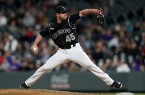 DENVER, COLORADO – MAY 29: Pitcher Scott Oberg #45 of the Colorado Rockies throws in the ninth inning against the Arizona Diamondbacks at Coors Field on May 29, 2019 in Denver, Colorado. (Photo by Matthew Stockman/Getty Images)