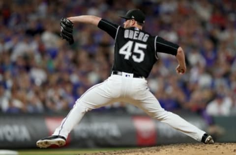 DENVER, COLORADO – JUNE 10: Pitcher Scott Oberg #45 of the Colorado Rockies throws in the eighth inning against the Chicago Cubs at Coors Field on June 10, 2019 in Denver, Colorado. (Photo by Matthew Stockman/Getty Images)