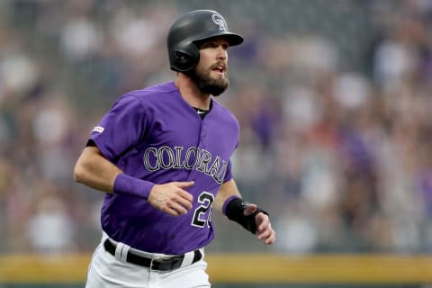 DENVER, COLORADO – JUNE 13: David Dahl #26 of the Colorado Rockies rounds third base to score on a Ian Desmond 2 RBI double in the first inning against the San Diego Padres at Coors Field on June 13, 2019 in Denver, Colorado. (Photo by Matthew Stockman/Getty Images)