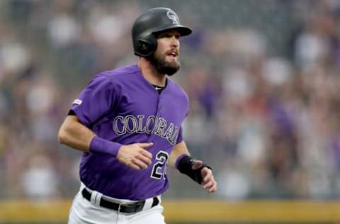 DENVER, COLORADO – JUNE 13: David Dahl #26 of the Colorado Rockies rounds third base to score on a Ian Desmond 2 RBI double in the first inning against the San Diego Padres at Coors Field on June 13, 2019 in Denver, Colorado. (Photo by Matthew Stockman/Getty Images)