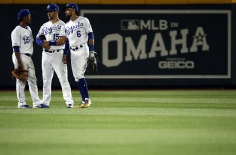 OMAHA, NEBRASKA – JUNE 13: Outfielders Billy Hamilton #6, Whit Merrifield #15, and Terrance Gore #0 of the Kansas City Royals chat as they wait for a pitching change during the 9th inning of the game at TD Ameritrade Park on June 13, 2019 in Omaha, Nebraska. (Photo by Jamie Squire/Getty Images)