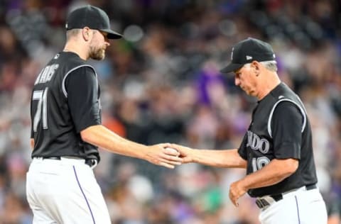 DENVER, CO – JULY 16: Manager Bud Black #10 of the Colorado Rockies takes Wade Davis #71 out of the game in the 10th inning against the San Francisco Giants at Coors Field on July 16, 2019 in Denver, Colorado. (Photo by Dustin Bradford/Getty Images)