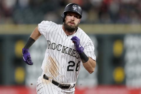 DENVER, COLORADO – JUNE 15: David Dahl #26 of the Colorado Rockies runs to third base after hitting a triple in the seventh inning against the San Diego Padres at Coors Field on June 15, 2019 in Denver, Colorado. (Photo by Matthew Stockman/Getty Images)