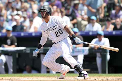 DENVER, COLORADO – JUNE 16: Ian Desmond #20 of the Colorado Rockies hits a RBI double in the first inning against the San Diego Padres at Coors Field on June 16, 2019 in Denver, Colorado. (Photo by Matthew Stockman/Getty Images)