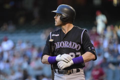 PHOENIX, ARIZONA – JUNE 18: Trevor Story #27 of the Colorado Rockies reacts while at bat in the first inning of a MLB game against the Arizona Diamondbacks at Chase Field on June 18, 2019 in Phoenix, Arizona. (Photo by Jennifer Stewart/Getty Images)