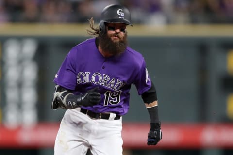 DENVER, COLORADO – JUNE 27: Charlie Blackmon #19 of the Colorado Rockies runs to third base after hitting a 2 RBI triple in the sixth inning against the Los Angeles Dodgers at Coors Field on June 27, 2019 in Denver, Colorado. (Photo by Matthew Stockman/Getty Images)