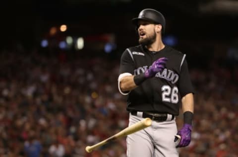 PHOENIX, ARIZONA – JULY 05: David Dahl #26 of the Colorado Rockies reacts to a strike out against the Arizona Diamondbacks during the third inning of the MLB game at Chase Field on July 05, 2019 in Phoenix, Arizona. (Photo by Christian Petersen/Getty Images)