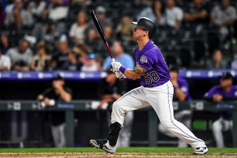 DENVER, CO – AUGUST 13: Dom Nunez #58 of the Colorado Rockies hits a solo home run for his first Major League hit in the eighth inning against the Arizona Diamondbacks at Coors Field on August 13, 2019 in Denver, Colorado. (Photo by Dustin Bradford/Getty Images)