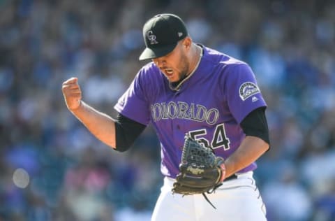 DENVER, CO – AUGUST 18: Carlos Estevez #54 of the Colorado Rockies reacts after striking out Lewis Brinson #9 of the Miami Marlins to end the top of the tenth inning of a game at Coors Field on August 18, 2019 in Denver, Colorado. (Photo by Dustin Bradford/Getty Images)