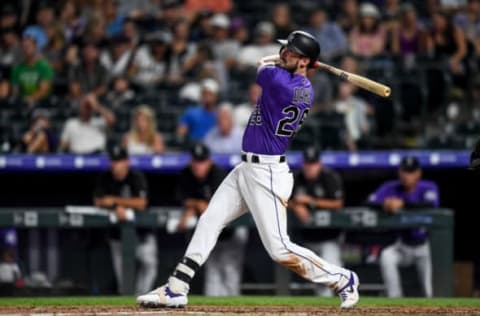 DENVER, CO – JULY 13: David Dahl #26 of the Colorado Rockies hits a third inning leadoff double against the Cincinnati Reds at Coors Field on July 13, 2019 in Denver, Colorado. (Photo by Dustin Bradford/Getty Images)