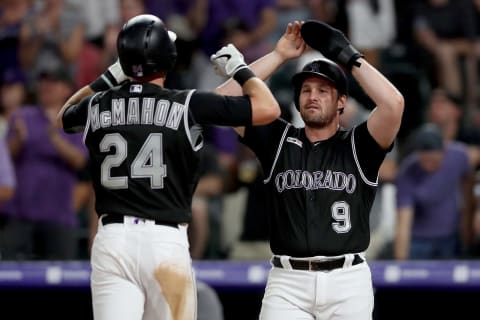 DENVER, COLORADO – AUGUST 02: Ryan McMahon #24 of the Colorado Rockies is congratulated by Daniel Murphy #9 after hitting a 2 RBI home run in the sixth inning against the San Francisco Giants at Coors Field on August 02, 2019 in Denver, Colorado. (Photo by Matthew Stockman/Getty Images)