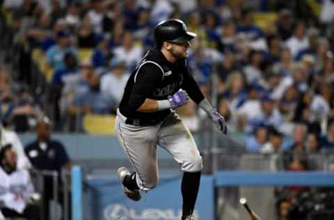 LOS ANGELES, CA – SEPTEMBER 04: Garrett Hampson #1 of the Colorado Rockies hits a base hit during the sixth inning against the Los Angeles Dodgers at Dodger Stadium on September 4, 2019 in Los Angeles, California. (Photo by Kevork Djansezian/Getty Images)