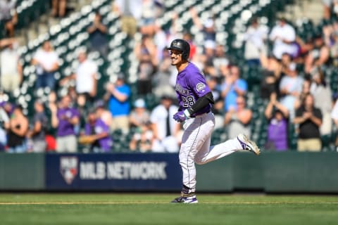 DENVER, CO – AUGUST 14: Nolan Arenado #28 of the Colorado Rockies smiles as he runs the bases after hitting a ninth inning walk off two-run homer against the Arizona Diamondbacks at Coors Field on August 14, 2019 in Denver, Colorado. (Photo by Dustin Bradford/Getty Images)