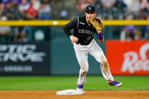 DENVER, CO – AUGUST 27: Trevor Story #27 of the Colorado Rockies fields a ground ball against the Boston Red Sox at Coors Field on August 27, 2019 in Denver, Colorado. (Photo by Justin Edmonds/Getty Images)