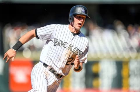 DENVER, CO – SEPTEMBER 1: Ryan McMahon #24 of the Colorado Rockies rounds third base before scoring a run in the sev tenth inning of a game against the Pittsburgh Pirates at Coors Field on September 1, 2019 in Denver, Colorado. (Photo by Dustin Bradford/Getty Images)