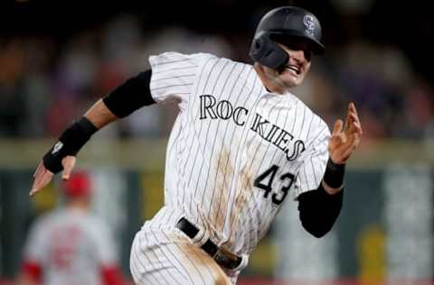 DENVER, COLORADO – SEPTEMBER 11: Sam Hilliard #43 of the Colorado Rockies rounds the bases to score on a Tony Wolters double in the fifth inning against the St Louis Cardinals at Coors Field on September 11, 2019 in Denver, Colorado. (Photo by Matthew Stockman/Getty Images)