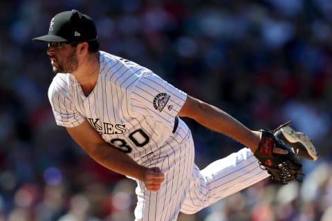 DENVER, COLORADO – SEPTEMBER 12: Joe Harvey #30 of the Colorado Rockies throws in the fifth inning against the St Louis Cardinals at Coors Field on September 12, 2019 in Denver, Colorado. (Photo by Matthew Stockman/Getty Images)