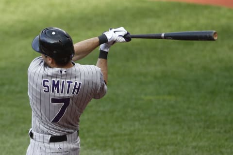 CLEVELAND,OH – JUNE 22: Seth Smith #7 of the Colorado Rockies connects with a pitch during the game against the Cleveland Indians on June 22, 2011 at Progressive Field in Cleveland, Ohio. The Cleveland Indians defeated the Colorado Rockies 4-3. (Photo by John Grieshop/Getty Images)