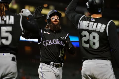 SAN FRANCISCO, CALIFORNIA – SEPTEMBER 24: Charlie Blackmon #19 of the Colorado Rockies celebrates a three run home run with Raimel Tapia #15 and Nolan Arenado #28 during the sixteenth inning against the San Francisco Giants at Oracle Park on September 24, 2019 in San Francisco, California. (Photo by Daniel Shirey/Getty Images)