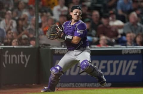 SAN FRANCISCO, CALIFORNIA – SEPTEMBER 25: Tony Wolters #14 of the Colorado Rockies reacts to the bases runners on base against the San Francisco Giants in the bottom of the fifth inning at Oracle Park on September 25, 2019 in San Francisco, California. (Photo by Thearon W. Henderson/Getty Images)