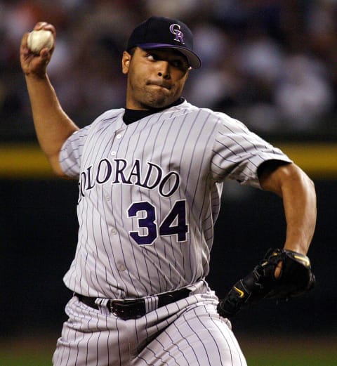 Colorado Rockies’ starter Shawn Chacon delivers a pitch during the second inning, against the Arizona Diamondbacks, 15 April, 2003 in Phoenix, Arizona. AFP Photo/ROY DABNER (Photo by ROY DABNER / AFP) (Photo by ROY DABNER/AFP via Getty Images)