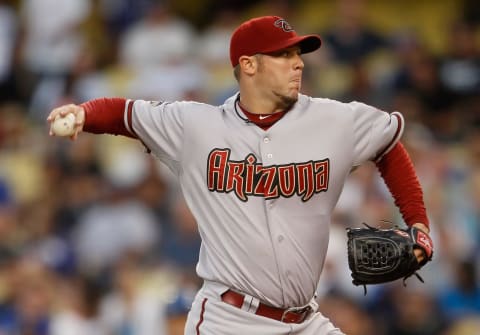 LOS ANGELES, CA – JULY 30: Micah Owings #15 of the Arizona Diamondbacks pitches against the Los Angeles Dodgers at Dodger Stadium on July 30, 2011 in Los Angeles, California. (Photo by Jeff Gross/Getty Images)