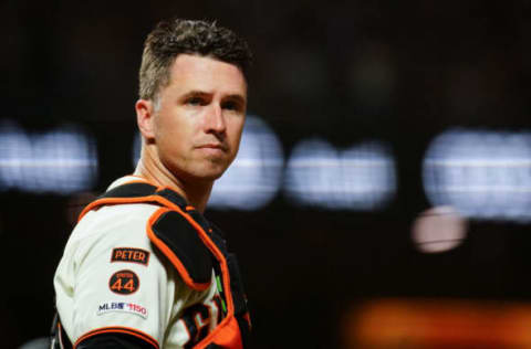 SAN FRANCISCO, CALIFORNIA – SEPTEMBER 24: Buster Posey #28 of the San Francisco Giants looks on during the game against the Colorado Rockies at Oracle Park on September 24, 2019 in San Francisco, California. (Photo by Daniel Shirey/Getty Images)