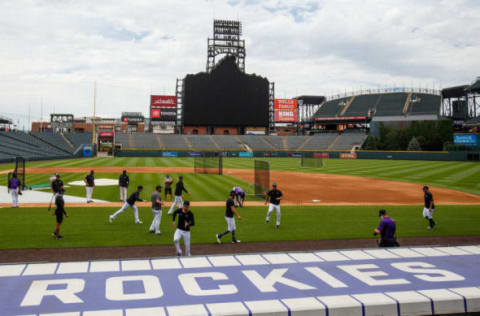 DENVER, CO – JULY 4: The Colorado Rockies stretch on the field during Major League Baseball Summer Workouts at Coors Field on July 4, 2020 in Denver, Colorado. (Photo by Justin Edmonds/Getty Images)