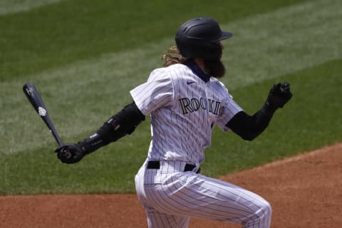 DENVER, CO – AUGUST 12: Charlie Blackmon #19 of the Colorado Rockies hits fielders choice during the third inning against the Arizona Diamondbacks at Coors Field on August 12, 2020 in Denver, Colorado. (Photo by Justin Edmonds/Getty Images)