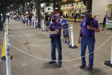 DENVER, CO – APRIL 1: Fans watch the game from sectioned off spaces on the concourse as the Los Angeles Dodgers take on the Colorado Rockies in the ninth inning on Opening Day at Coors Field on April 1, 2021 in Denver, Colorado. The Rockies defeated the Dodgers 8-5. (Photo by Justin Edmonds/Getty Images)