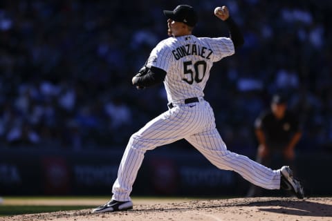 DENVER, CO – APRIL 1: Chi Chi Gonzalez #50 of the Colorado Rockies delivers to home plate during the sixth inning against the Los Angeles Dodgers on Opening Day at Coors Field on April 1, 2021 in Denver, Colorado. (Photo by Justin Edmonds/Getty Images)