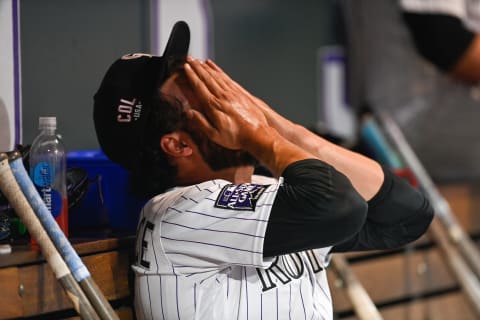 DENVER, CO – JULY 02: Justin Lawrence #61 of the Colorado Rockies reacts in the dugout after allowing the tying run with two outs and two strikes in the bottom of the ninth inning of a game against the St. Louis Cardinals at Coors Field on July 2, 2021 in Denver, Colorado. (Photo by Dustin Bradford/Getty Images)