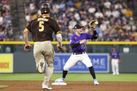 DENVER, CO – AUGUST 16: Trevor Story #27 of the Colorado Rockies starts a double play against Wil Myers #5 of the San Diego Padres at second base in the fifth inning at Coors Field on August 16, 2021 in Denver, Colorado. (Photo by Michael Ciaglo/Getty Images)