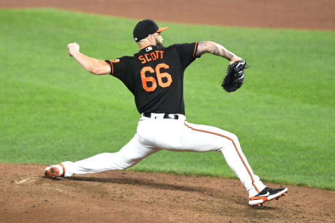 BALTIMORE, MD – AUGUST 27: Tanner Scott #66 of the Baltimore Orioles pitches in the seventh inning during a baseball game against the Tampa Bay Rays at Oriole Park at Camden Yards on August 27, 2021 in Washington, DC. (Photo by Mitchell Layton/Getty Images)