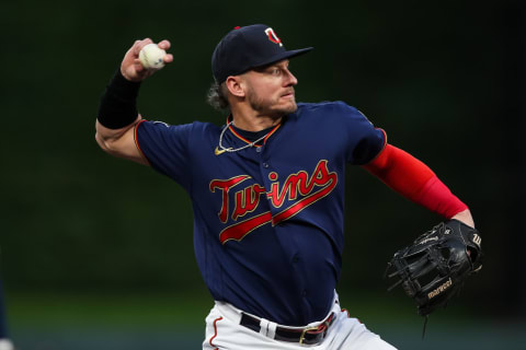 MINNEAPOLIS, MN – SEPTEMBER 29: Josh Donaldson #20 of the Minnesota Twins throws the ball to first base to get out Jonathan Schoop of the Detroit Tigers in the first inning at Target Field on September 29, 2021 in Minneapolis, Minnesota. (Photo by David Berding/Getty Images)