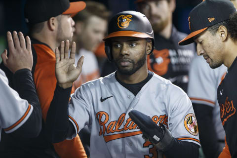 TORONTO, ON – OCTOBER 01: Cedric Mullins #31 of the Baltimore Orioles celebrates a run off a Trey Mancini #16 single in the eighth inning of their MLB game against the Toronto Blue Jays at Rogers Centre on October 1, 2021 in Toronto, Ontario. (Photo by Cole Burston/Getty Images)