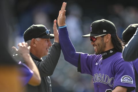 DENVER, CO – APRIL 10: Bud Black #10 of the Colorado Rockies is congratulated by Connor Joe #9 after a win against the Los Angeles Dodgers that was the 1,000th win of his managerial career at Coors Field on April 10, 2022 in Denver, Colorado. (Photo by Dustin Bradford/Getty Images)