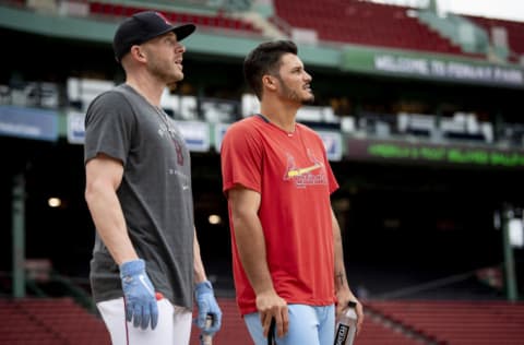 BOSTON, MA - JUNE 18: Trevor Story #10 of the Boston Red Sox reacts with Nolan Arenado #28 of the St. Louis Cardinals during batting practice before a game on June 18, 2022 at Fenway Park in Boston, Massachusetts. (Photo by Maddie Malhotra/Boston Red Sox/Getty Images)