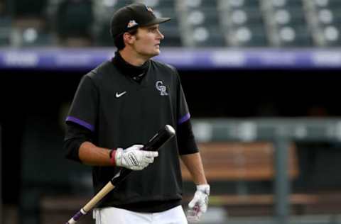 DENVER, COLORADO – JULY 10: Sam Hilliard of the Colorado Rockies takes batting practice during summer workouts at Coors Field on July 10, 2020 in Denver, Colorado. (Photo by Matthew Stockman/Getty Images)