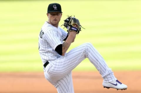 DENVER, COLORADO – AUGUST 01: Starting pitcher Kyle Freeland #21 of the Colorado Rockies throws in the first inning against the San Diego Padres at Coors Field on August 01, 2020 in Denver, Colorado. (Photo by Matthew Stockman/Getty Images)