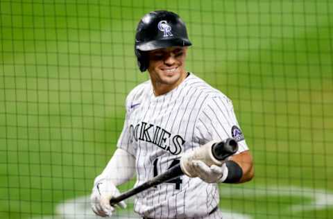 DENVER, CO – AUGUST 15: Tony Wolters #14 of the Colorado Rockies smiles while on deck during the ninth inning against the Texas Rangers at Coors Field on August 15, 2020 in Denver, Colorado. The Rangers defeated the Rockies 6-4. (Photo by Justin Edmonds/Getty Images)