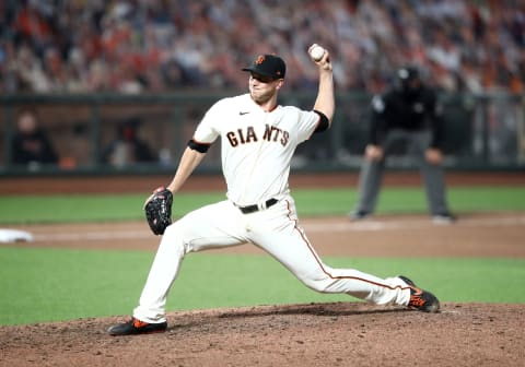 SAN FRANCISCO, CALIFORNIA – AUGUST 19: Tony Watson #56 of the San Francisco Giants pitches against the Los Angeles Angels in the ninth inning at Oracle Park on August 19, 2020 in San Francisco, California. (Photo by Ezra Shaw/Getty Images)