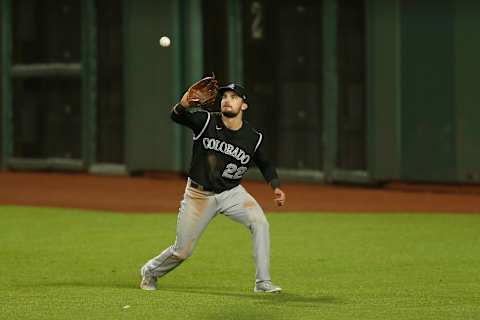 SAN FRANCISCO, CALIFORNIA – SEPTEMBER 21: Sam Hilliard #22 of the Colorado Rockies catches a fly ball against the San Francisco Giants at Oracle Park on September 21, 2020 in San Francisco, California. (Photo by Lachlan Cunningham/Getty Images)