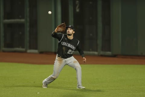 SAN FRANCISCO, CALIFORNIA – SEPTEMBER 21: Sam Hilliard #22 of the Colorado Rockies catches a fly ball against the San Francisco Giants at Oracle Park on September 21, 2020 in San Francisco, California. (Photo by Lachlan Cunningham/Getty Images)