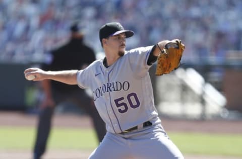 SAN FRANCISCO, CALIFORNIA – SEPTEMBER 24: Chi Chi Gonzalez #50 of the Colorado Rockies pitches in the bottom of the first inning against the San Francisco Giants at Oracle Park on September 24, 2020 in San Francisco, California. (Photo by Lachlan Cunningham/Getty Images)